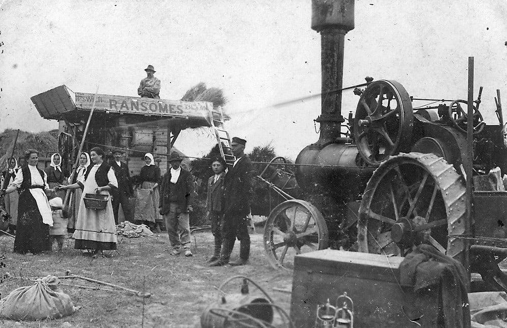 Vintage photo of early pioneers stripping UTM parameters from a field of data.