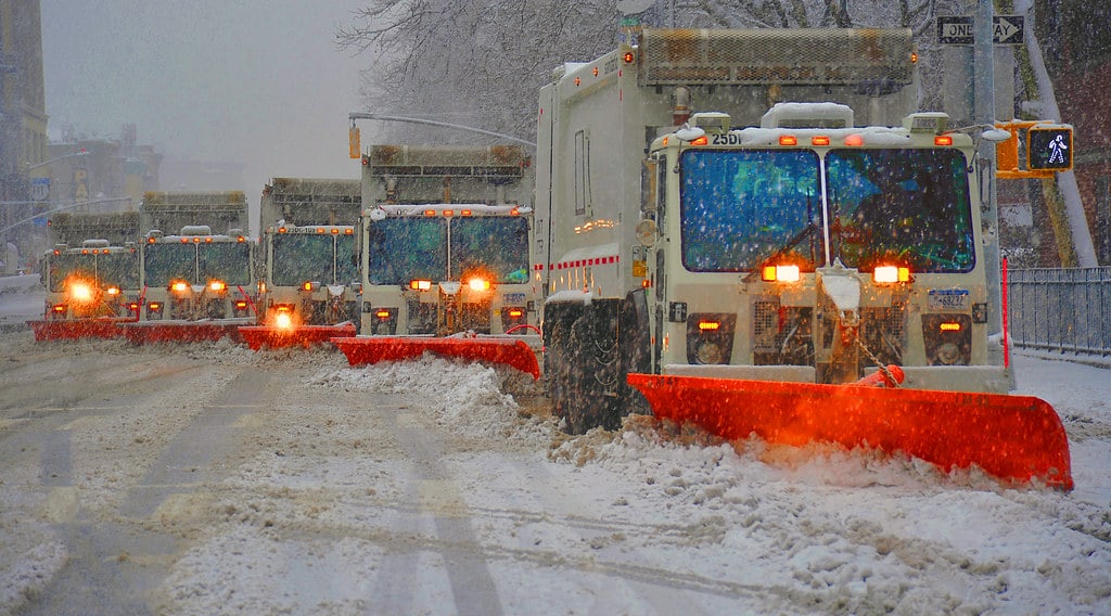 Trucks cleaning up the cache (snow)